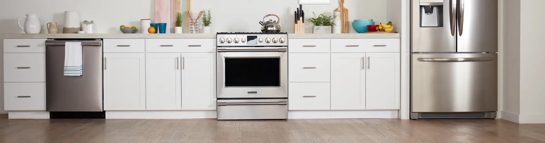 kitchen flooring with white cabinets